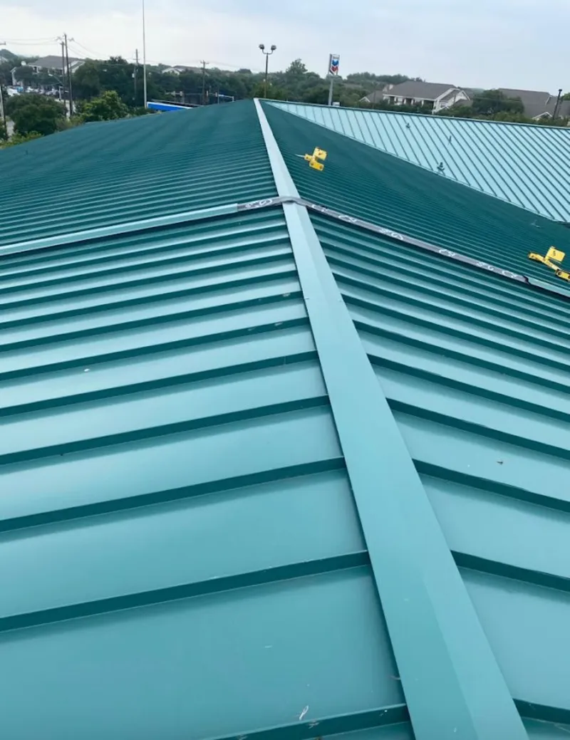 Green commercial metal roof ridge and valley for Metal Roof Repair in Fridley